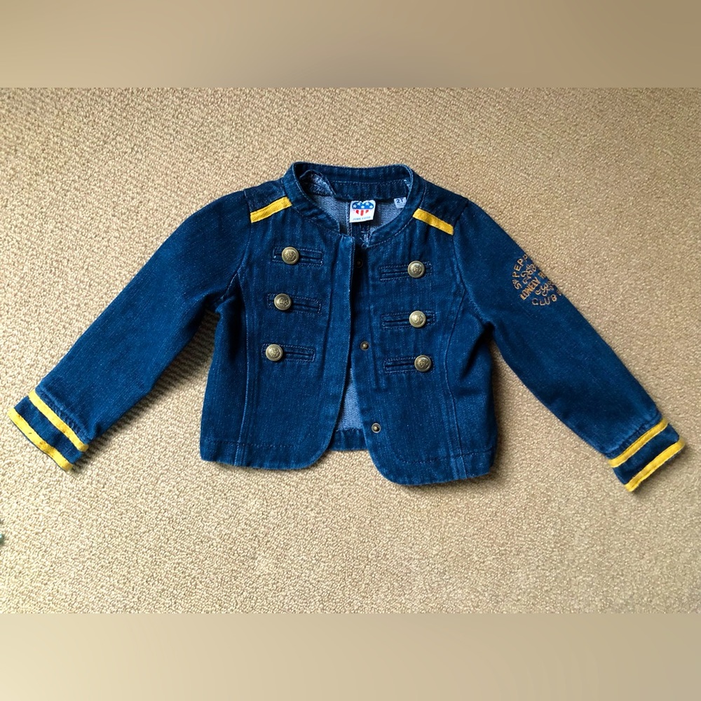 The Beatles Sg Peppers Lonely Hearts Club Band denim jacket.